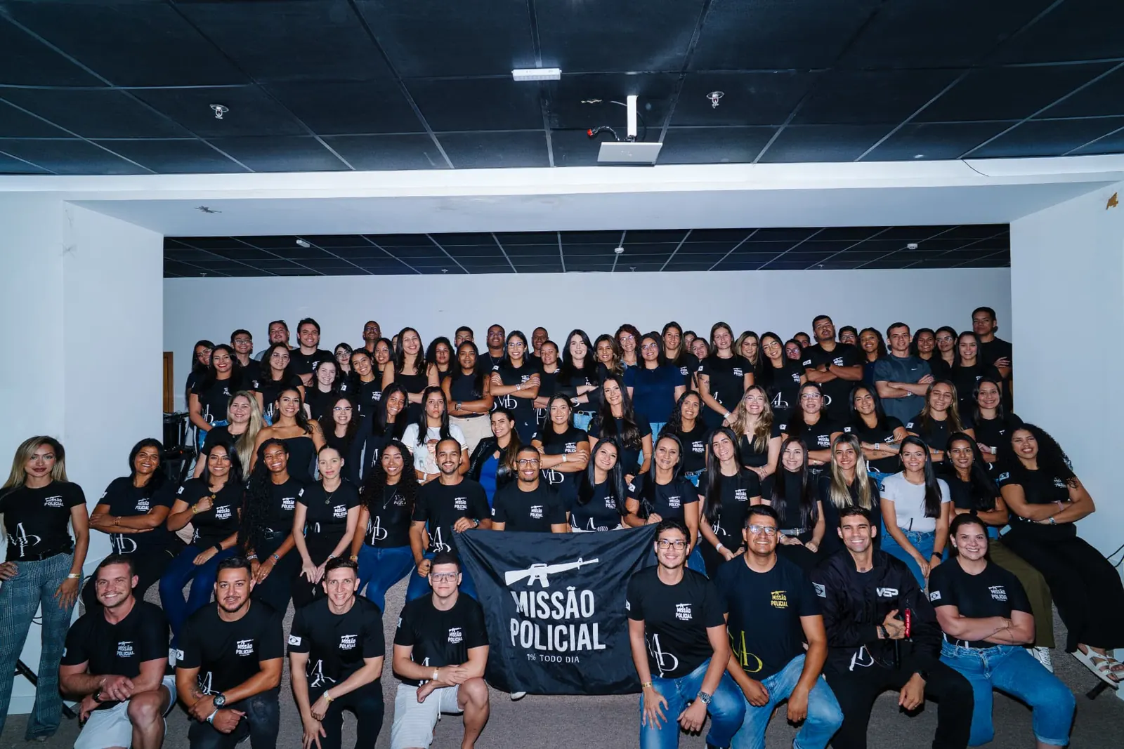 Alunos da MSP reunidos no auditório durante a formatura